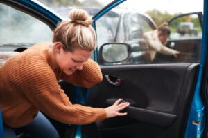 Woman with neck pain after a car accident